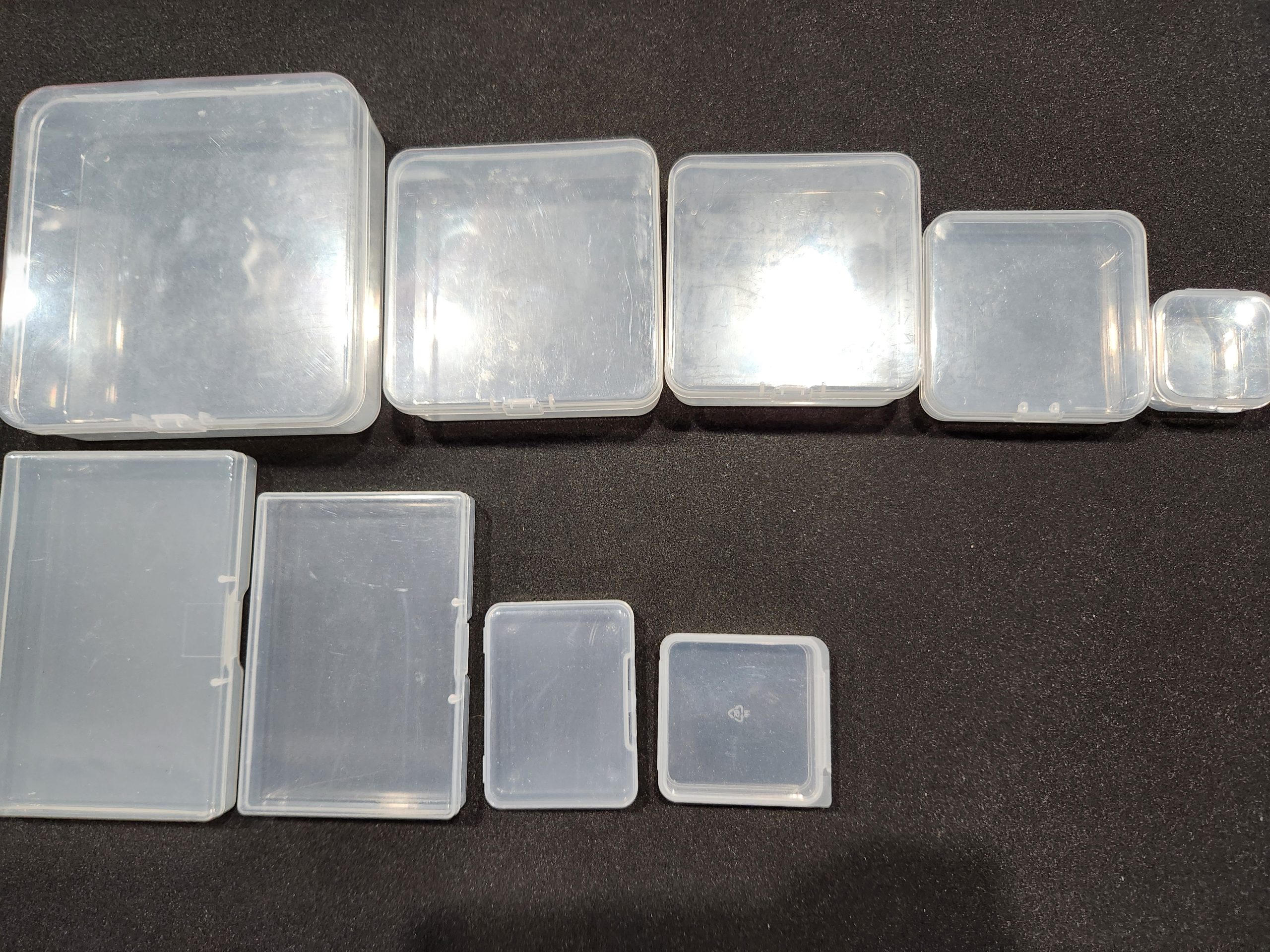 Small latching plastic storage boxes