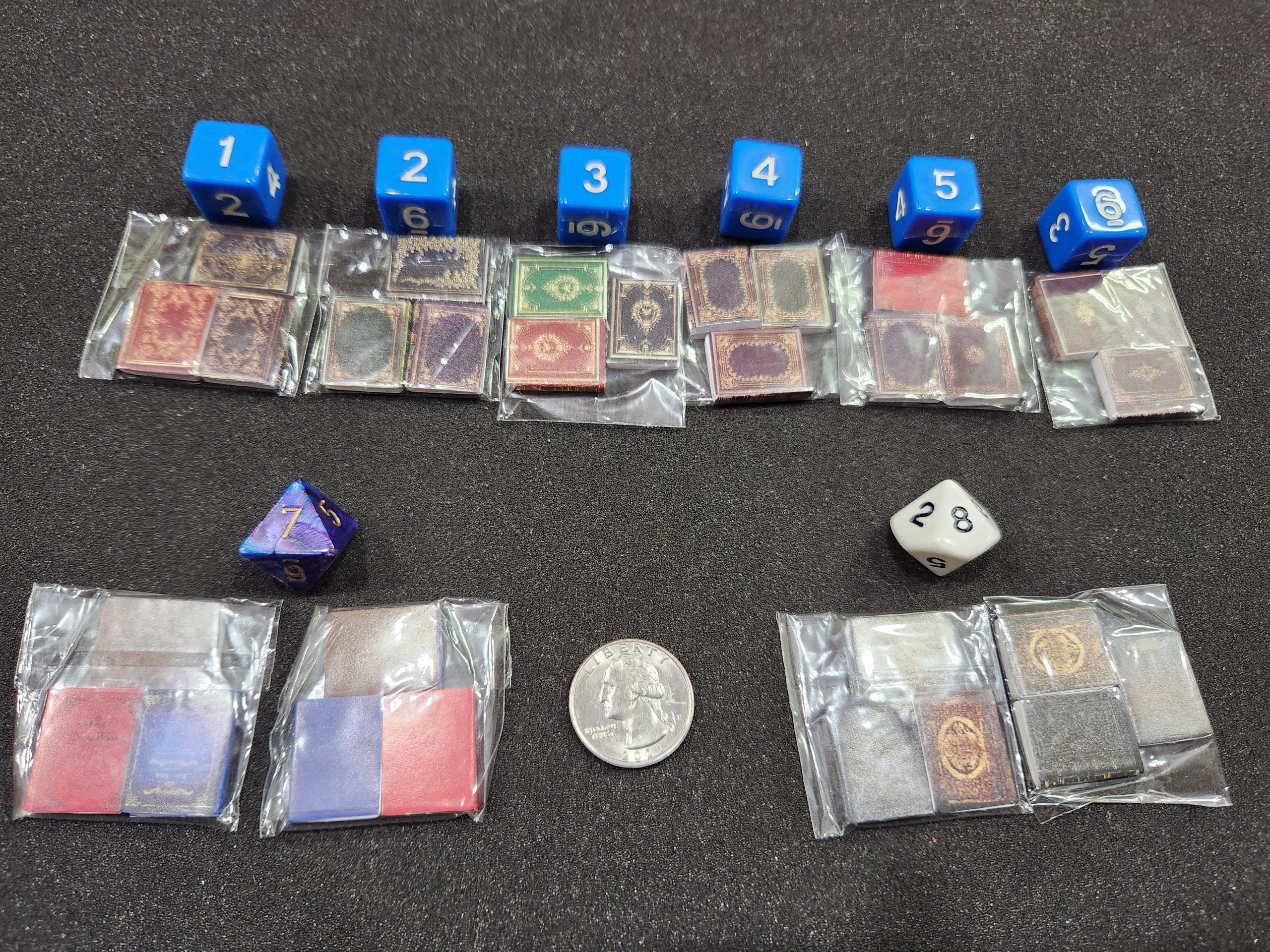 Doll house books with detailed covers.